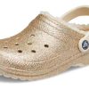 Klasyczne chodaki Crocs z brokatową podszewką w kolorze złotym 504271