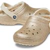 Klasyczne chodaki Crocs z brokatową podszewką w kolorze złotym 504271