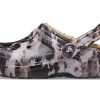 Klasyczne chodaki Crocs z podszewką i wybielaczem w kolorze czarno-białym i beżowym 207299-001